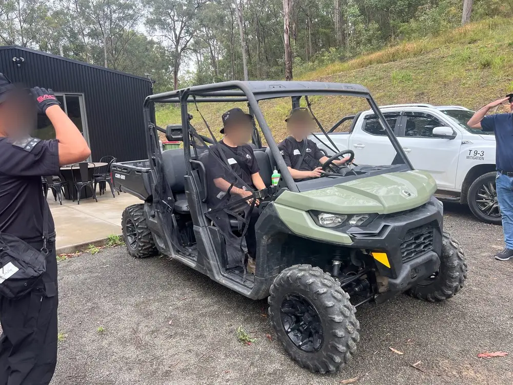 Trainees in the side-by-side buggy outside the lodge at the Hunter Valley base.