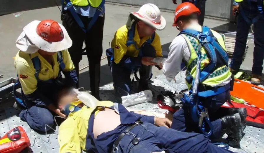 Emergency Service Officers working through a casualty scenario on site.